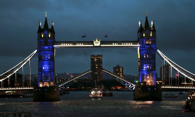 Following the attacks in Paris, blue lights, in a sequence of blue, white and red projections representing France's national flag, illuminate Tower Bridge in London
